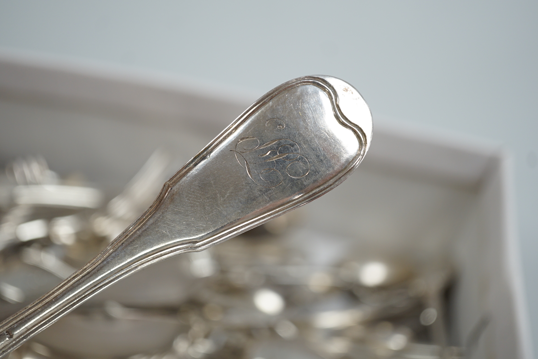 A set of six Victorian silver fiddle pattern table forks, London, 1854 and a group of mixed Victorian and later flatware, 46.5oz and a small quantity of Swiss? white metal flatware, 24.5oz.